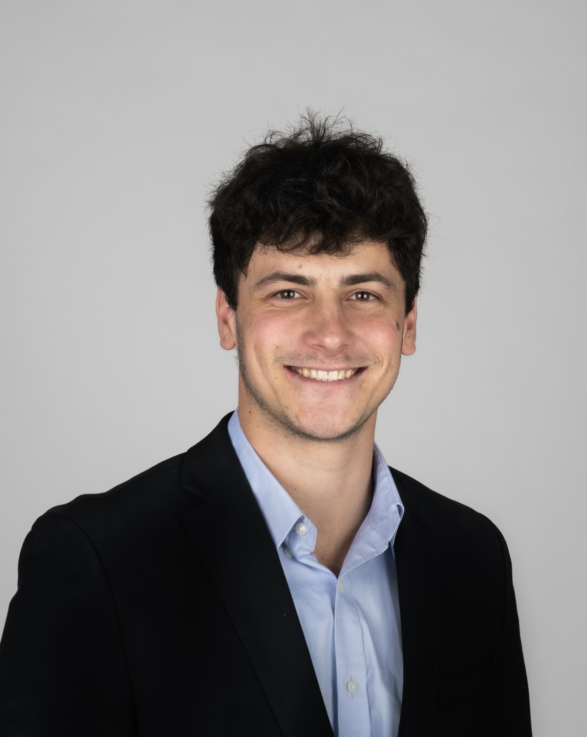 Zev, financial literacy coach and Syracuse University Economics graduate